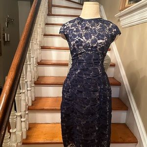 Navy blue cap sleeve lace dress. Perfect for the holiday season.